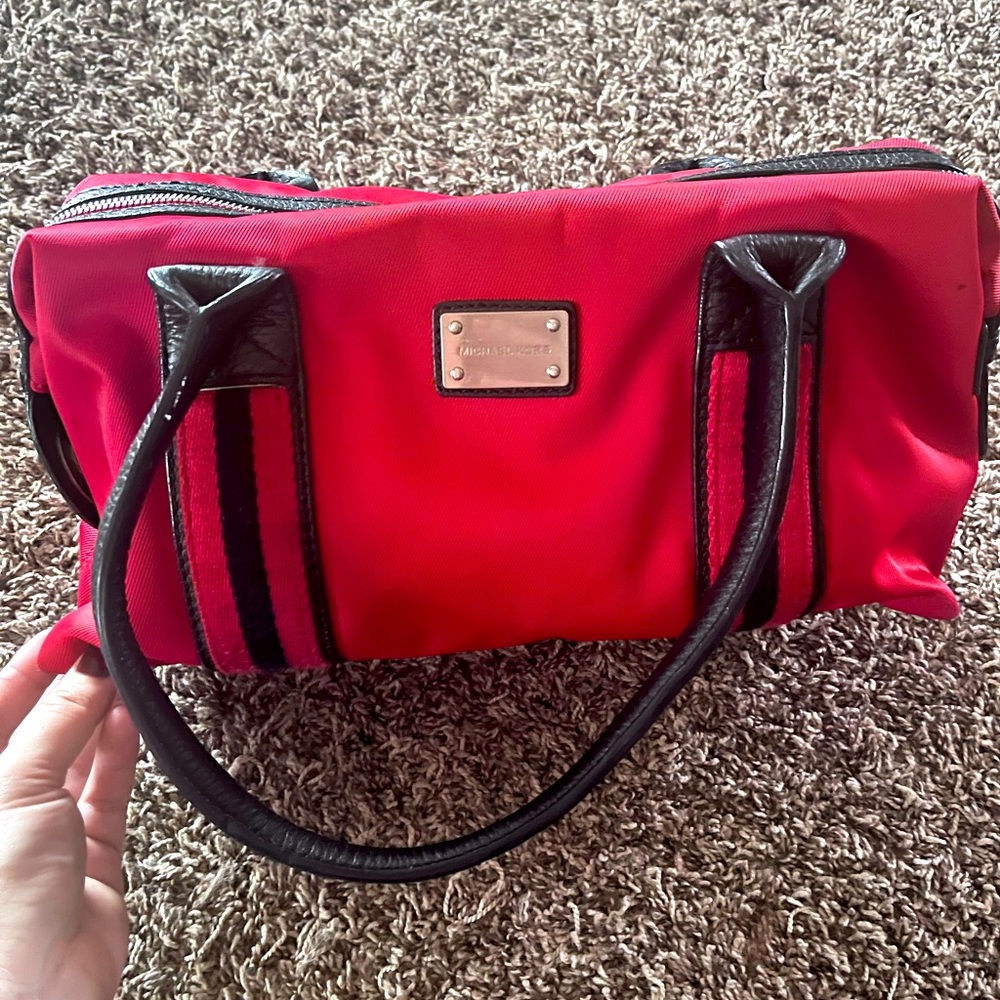Michael Kors small travel red duffel/shoulder bag